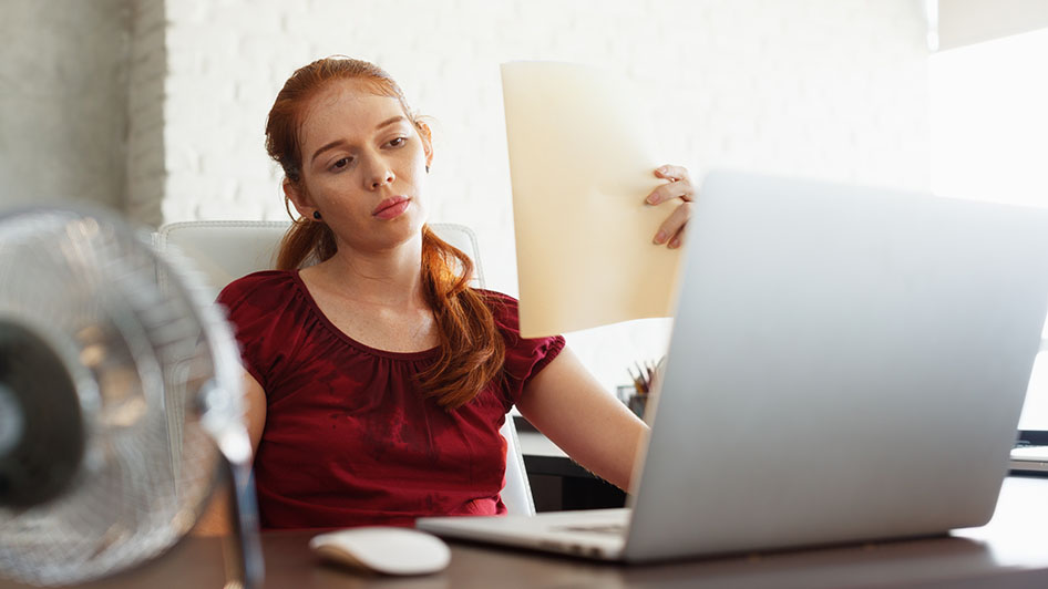 An employee in a warm office.